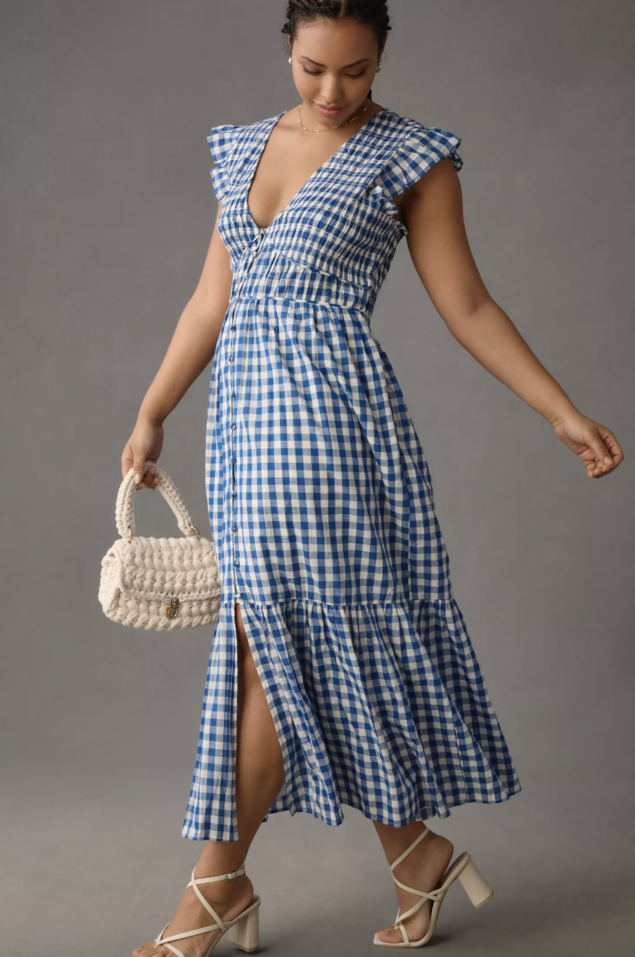 plus size model wearing blue and white gingham The Peregrine Midi Dress (photo via Anthropologie)