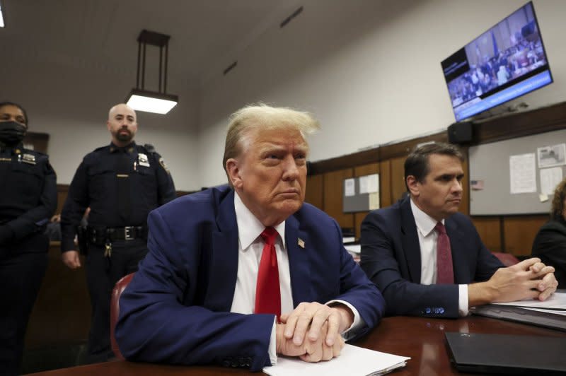 Former President Donald Trump sits in the courtroom at Manhattan Criminal Court in New York on Monday. Pool Photo by Brendan McDermid/UPI