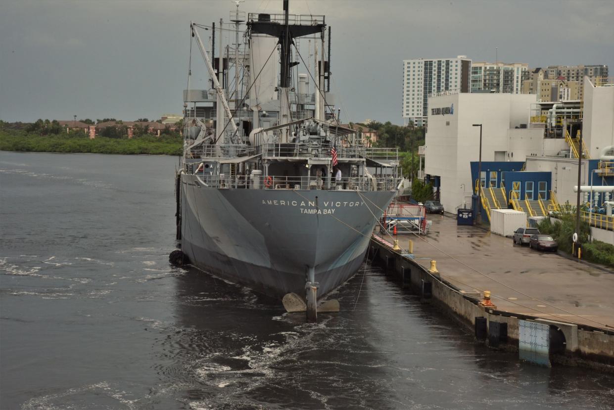 Tampa, Florida - USA - September 2018 - American Victory Mariners' Memorial and Museum Ship as seen from bow while leaving Tampa Bay