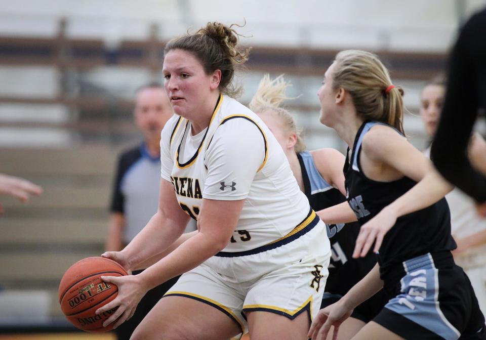 Siena Heights forward Peyton Banks handles the ball during Monday's game against Grace Christian.