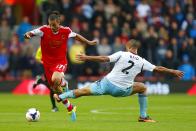 Southampton's Pablo Osvaldo (left) and West Ham United's Winston Reid battle for the ball