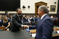 Facebook Head of Global Policy Development Matt Perault, left, shakes hands with Rep. David Cicilline, D-R.I., chair of the House Judiciary antitrust subcommittee, before testifying at a hearing, Tuesday, July 16, 2019, on Capitol Hill in Washington. (AP Photo/Patrick Semansky)