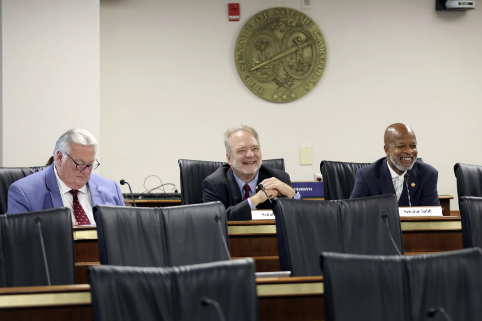 State Sens. Billy Garrett, R-McCormick, left, Brad Hutto, D-Orangeburg, center, and Ronnie Sabb. D-Greeleyville, right, attend a hearing on a hate crimes bill, Tuesday, March 28, 2023, in Columbia, S.C. (AP Photo/Jeffrey Collins)