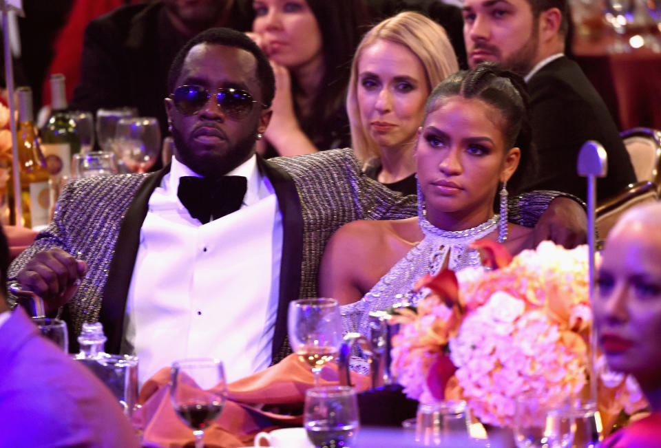 Diddy and Cassie sit together at a pre-Grammys event in 2017.