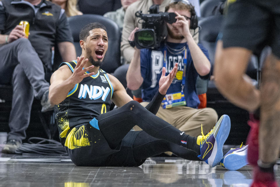 Indiana Pacers guard Tyrese Haliburton (0) reacts after a shot-attempt during the second half of an NBA basketball game against the Toronto Raptors in Indianapolis, Monday, Feb. 26, 2024. (AP Photo/Doug McSchooler)