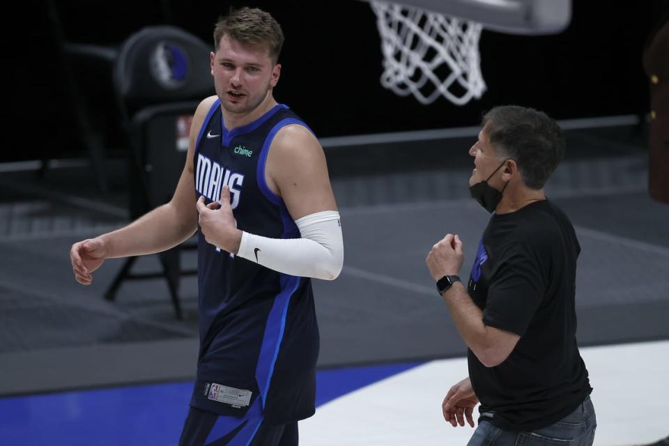 <div class="inline-image__caption"><p>Luka Doncic of the Dallas Mavericks walks off the court with team owner Mark Cuban after the Mavericks beat the Detroit Pistons 127-117 at American Airlines Center on April 21, 2021, in Dallas, Texas.</p></div> <div class="inline-image__credit">Tom Pennington/Getty</div>