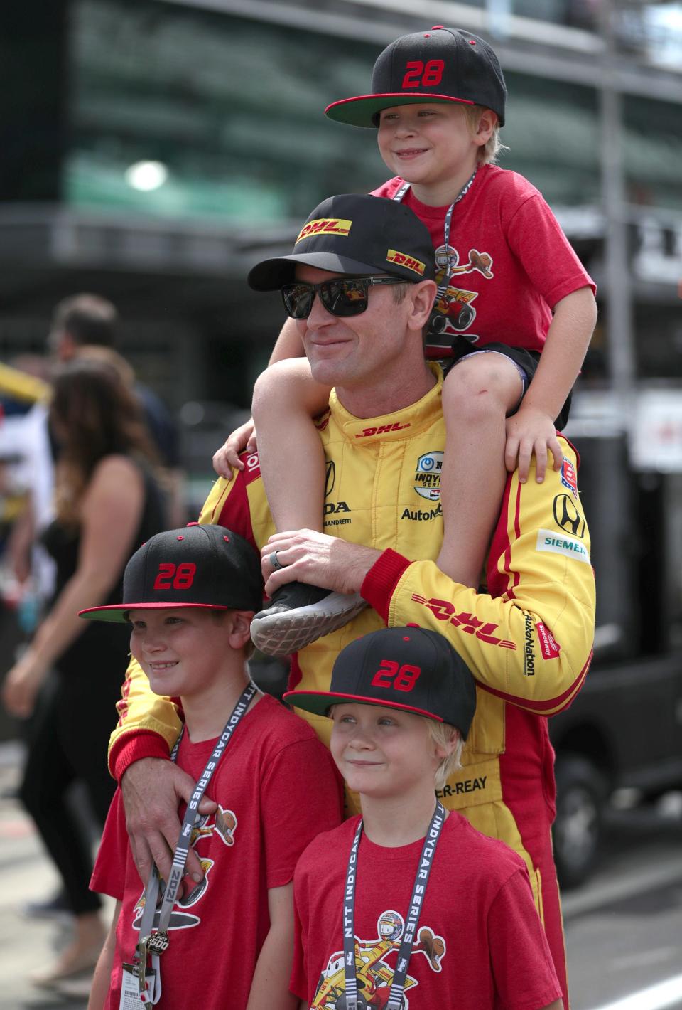 Andretti Autosport driver Ryan Hunter-Reay (28) takes a picture with his kids ahead of Big Machine Spiked Coolers Grand Prix on Saturday, Aug. 14, 2021, at Indianapolis Motor Speedway. 