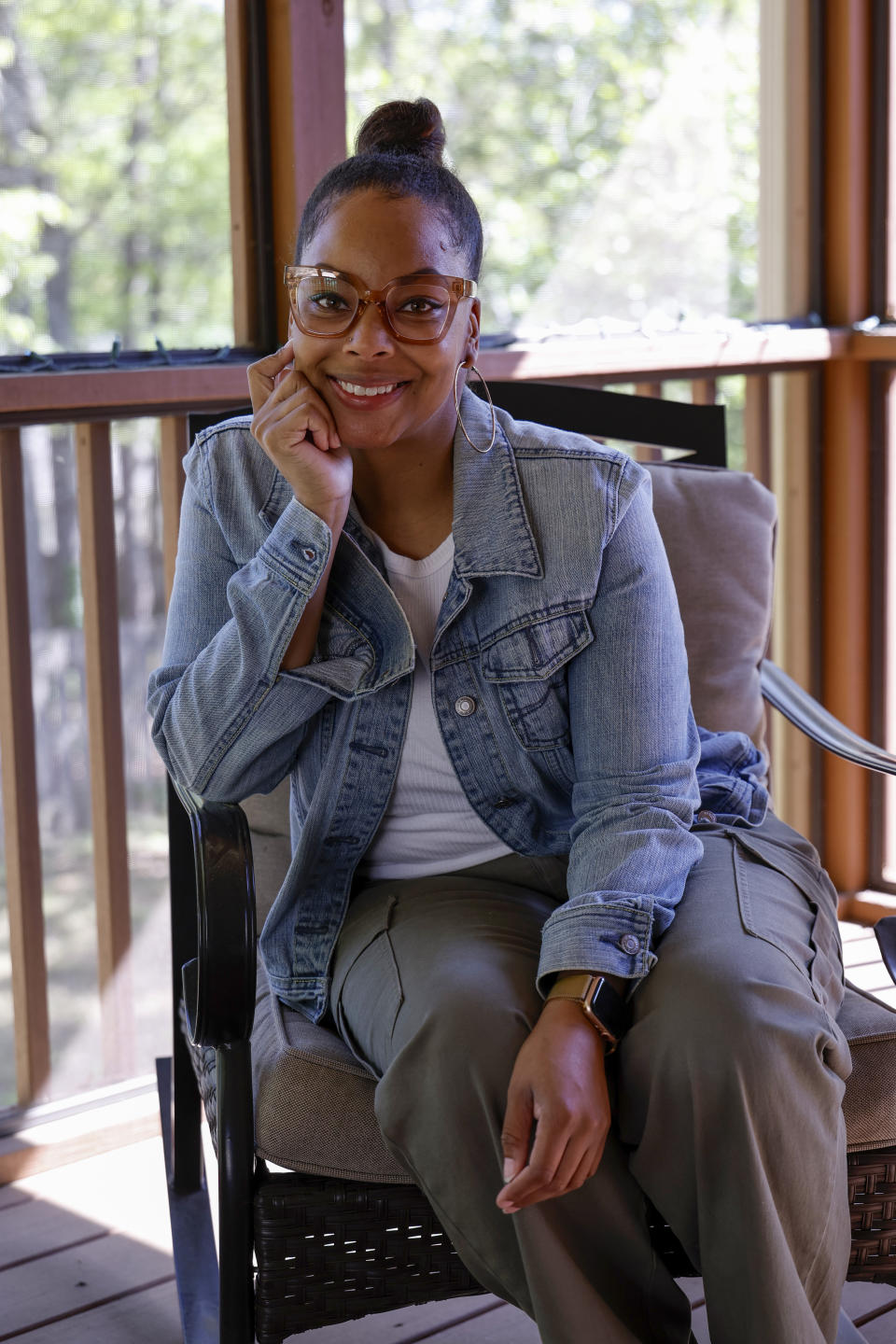 Adriane Burnett poses for a photo on Saturday, April 14, 2024 in Birmingham, Ala. Women's participation in the American workforce has reached a high point, but challenges around child care are holding back many working class parents. When women without college degrees face an interruption in child care arrangements – whether it's at a relative's home, a preschool or a daycare center – they are more likely to have to take unpaid time or to be forced to leave their jobs altogether, according to an Associated Press analysis. (AP Photo/Butch Dill)