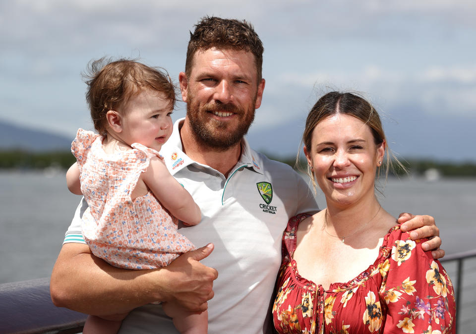 Aaron Finch, pictured here with wife Amy and daughter Esther.