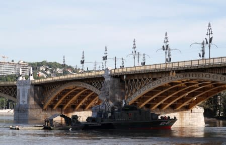 Black flags are seen on the Margaret bridge on the Danube river in Budapest