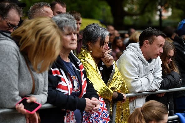 LONDON, ENGLAND - SEPTEMBER 19: Mourners at Westminster Abbey for the State Funeral of Queen Elizabeth II on September 19, 2022 in London, England. Elizabeth Alexandra Mary Windsor was born in Bruton Street, Mayfair, London on 21 April 1926. She married Prince Philip in 1947 and ascended the throne of the United Kingdom and Commonwealth on 6 February 1952 after the death of her Father, King George VI. Queen Elizabeth II died at Balmoral Castle in Scotland on September 8, 2022, and is succeeded by her eldest son, King Charles III.  (Photo by Anthony Devlin/Getty Images)