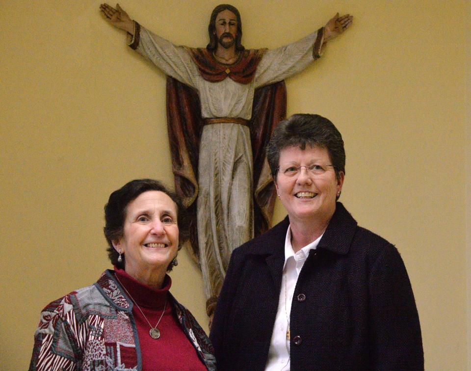 Sister of St. Joseph Linda Fusco, 73, left, and Erie Benedictine Sister Katherine Horan, 59, are shown at Blessed Sacrament School, where they serve as a math specialist and principal, respectively, in Erie on Feb. 15.