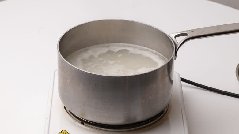 boiling rice in a saucepan