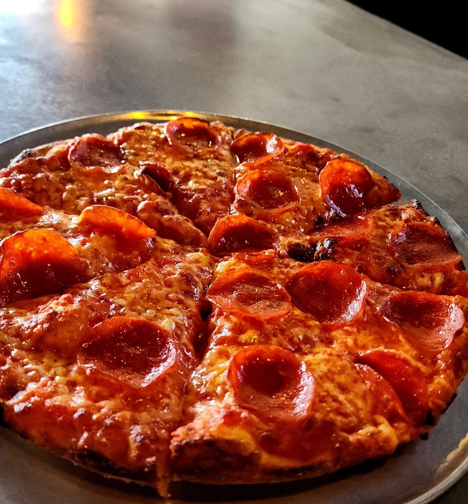 The Pepperoni Pizza at Grainsley's Kitchen + Drinks is made and served in a pan, bar-style.