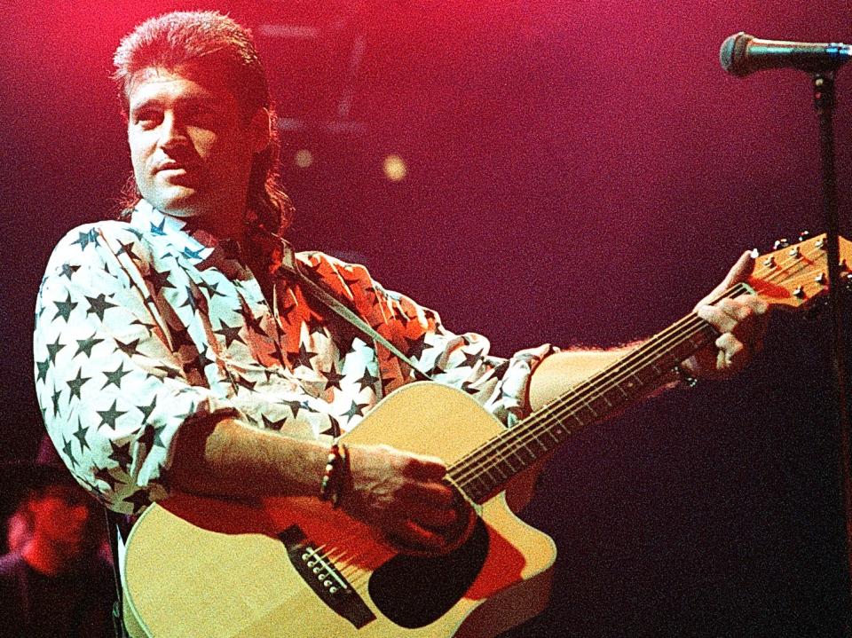 Billy Ray Cyrus performs at The Omni in Atlanta Georgia October 07, 1993