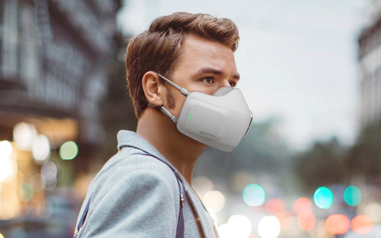 PuriCare Wearable Air Purifier is due to go on sale later this year and claims to combat common issues that arise when wearing a normal mask - LG Electronics /Reuters