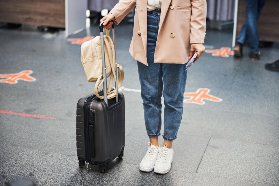 traveller wearing sneakers