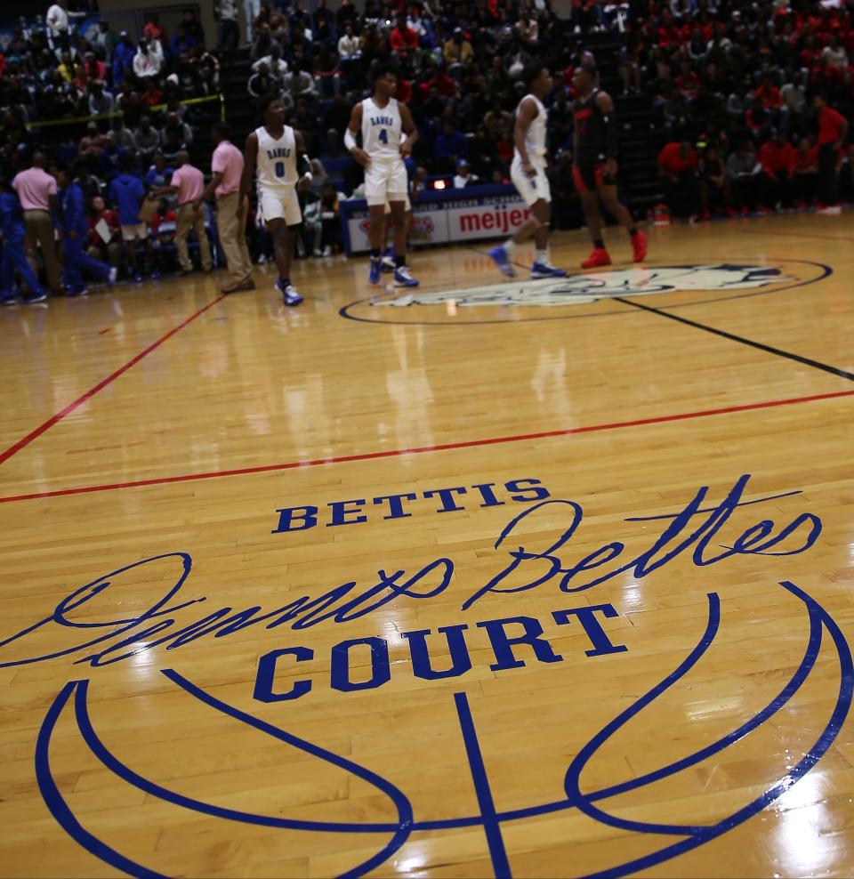 Woodward High School basketball takes to floor at the new named Dennis Bettis Court, before their game against Hughes, Friday, Dec. 6, 2019.