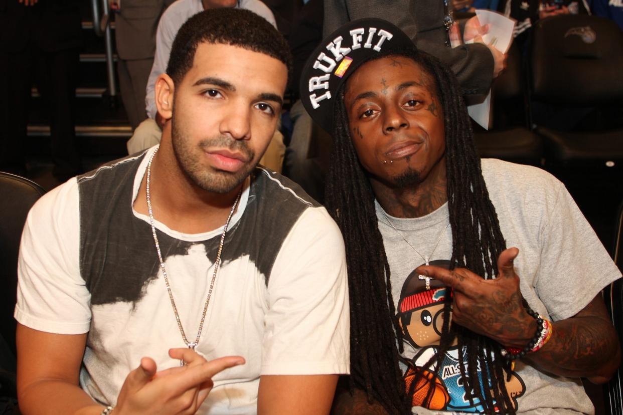 ORLANDO, FL - FEBRUARY 26: Lil Wayne and Drake pose for a photograph during the 2012 NBA All-Star Game presented by Kia Motors as part of 2012 All-Star Weekend at the Amway Center on February 26, 2012 in Orlando, Florida. NOTE TO USER: User expressly acknowledges and agrees that, by downloading and/or using this photograph, user is consenting to the terms and conditions of the Getty Images License Agreement. Mandatory Copyright Notice: Copyright 2012 NBAE (Photo by Bruce Yeung/NBAE via Getty Images)