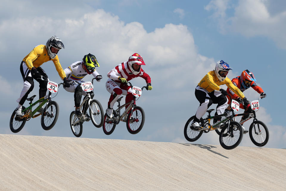 LONDON, ENGLAND - AUGUST 09: (L-R) Brian Kirkham of Australia, Carlos Mario Oquendo Zabala of Colombia, Maris Strombergs of Latvia, Sam Willoughby of Australia and Twan van Gendt of the Netherlands clear a jump during the Men's BMX Cycling Quarter Finals on Day 13 of the London 2012 Olympic Games at BMX Track on August 9, 2012 in London, England. (Photo by Bryn Lennon/Getty Images)