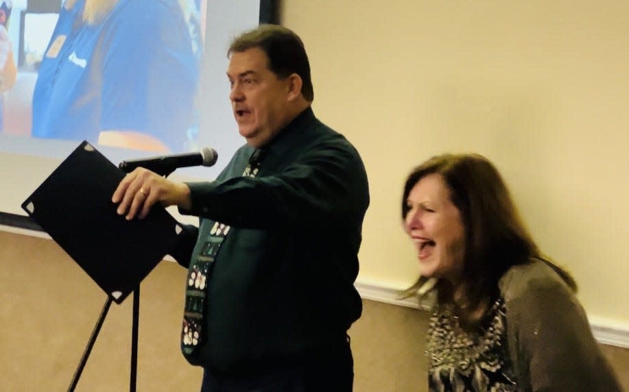Port Orange Mayor Don Burnette cracks a joke that gets a laugh out of Debbie Connors at her retirement party after 22 years of service as CEO of the Port Orange South Daytona Chamber of Commerce on Wednesday evening, Dec. 21, 2022.