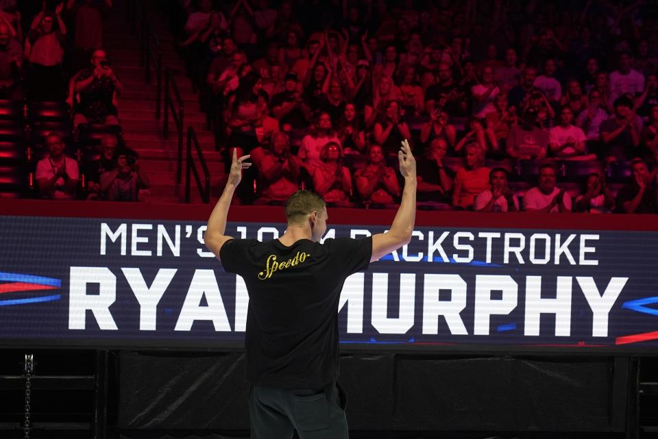 Ryan Murphy celebrates after winning the Men's 100 backstroke finals Monday, June 17, 2024, at the US Swimming Olympic Trials in Indianapolis. (AP Photo/Darron Cummings)