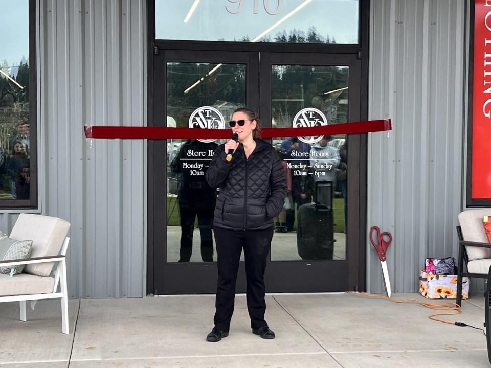 St. Vincent de Paul of Lane County celebrates opening a new retail location in Cottage Grove on Thursday morning with opening remarks presented by Executive Director Bethany Cartledge.