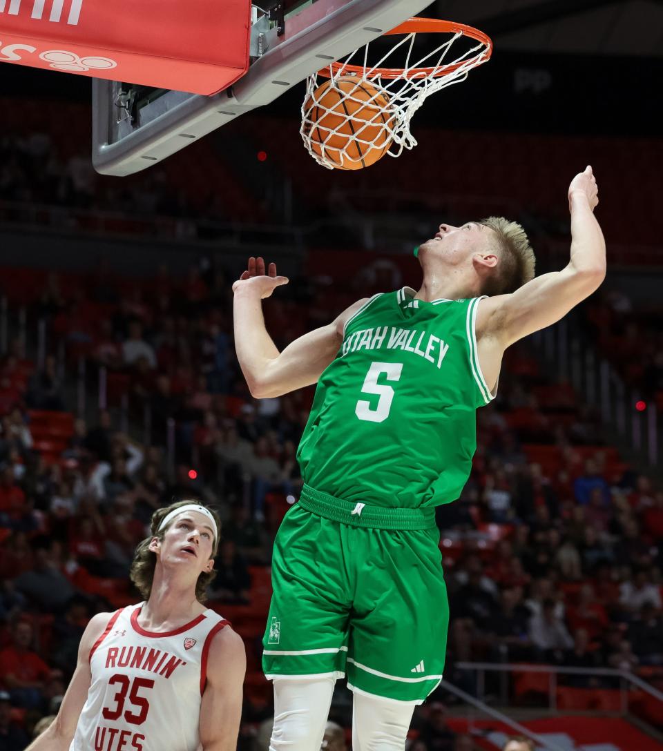 Utah Valley Wolverines guard Tanner Toolson (5) puts the ball in during the game against the Utah Utes at the Huntsman Center in Salt Lake City on Saturday, Dec. 16, 2023. | Spenser Heaps, Deseret News