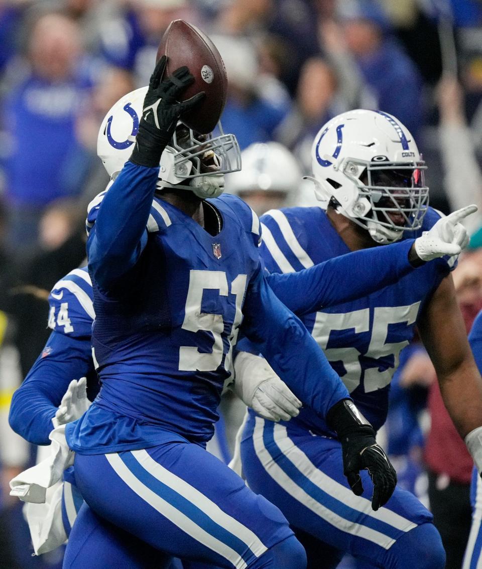 Indianapolis Colts defensive end Kwity Paye (51) reacts after coming up with a turnover Monday, Dec. 26, 2022, during a game against the Los Angeles Chargers at Lucas Oil Stadium in Indianapolis.