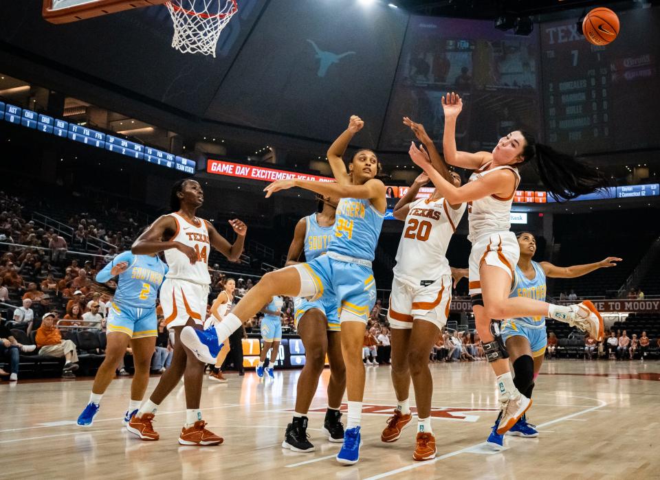 Texas' Shaylee Gonzales, right, and Khadija Faye battle Southern guard Kyanna Morgan for a rebound Nov. 8 at Moody Center. The two Longhorns will be honored at Saturday's regular-season finale with BYU on Texas' senior night.