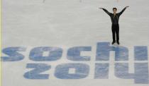 Patrick Chan of Canada competes during the Team Men Short Program at the Sochi 2014 Winter Olympics, February 6, 2014. REUTERS/David Gray (RUSSIA - Tags: SPORT FIGURE SKATING OLYMPICS)