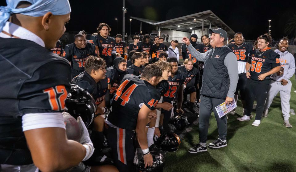 Ventura College head coach Steve Mooshagian speaks to his team following the Pirates' 38-20 win over Bakersfield on Saturday night at the VC Sportsplex.