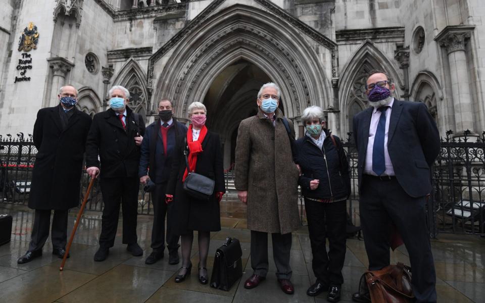 L to R: Mark Turnbull, Terry Renshaw, Harry Chadwick, Eileen Turnbull, John McKinsie Jones with wife Rita, and lawyer Jamie Potter ahead of a hearing in the Court of Appeal for the Shrewsbury 24 - Victoria Jones/PA