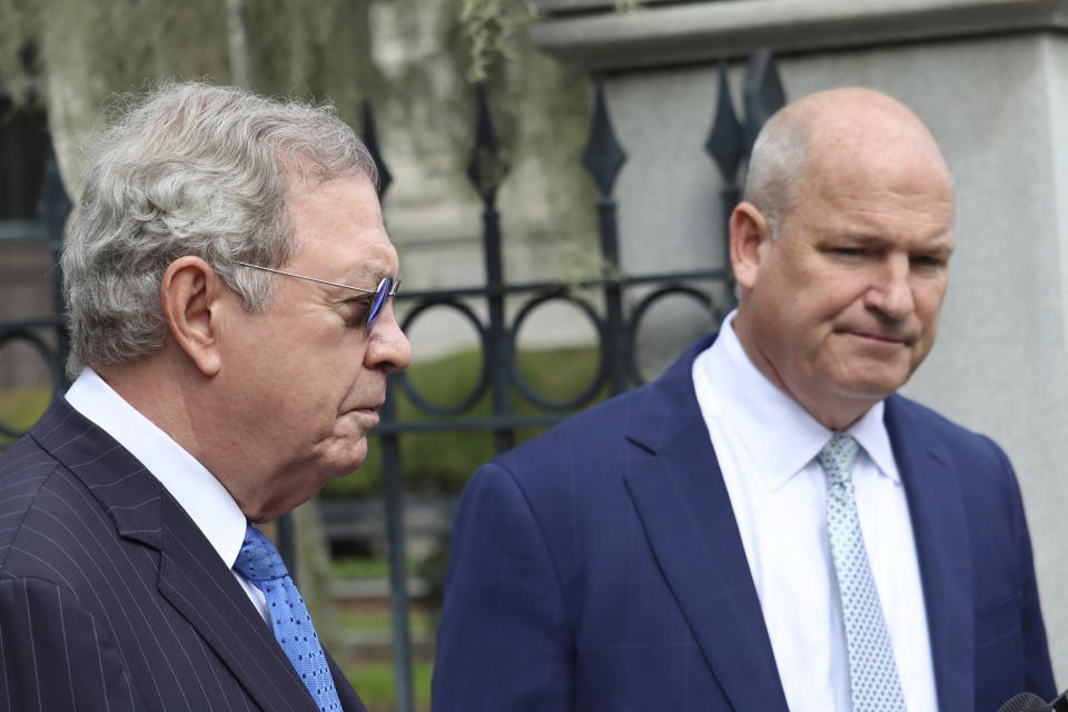 Defense attorneys for Alex Murdaugh, Dick Harpootlian, left, and Jim Griffin, right, speak with reporters outside the federal courthouse in Charleston, S.C. on Thursday, Sept. 21, 2023. Murdaugh has pleaded guilty in federal court to financial crimes. Thursday’s court appearance is the first time the disbarred attorney has admitted responsibility for a crime before a judge.(AP Photo/James Pollard)
