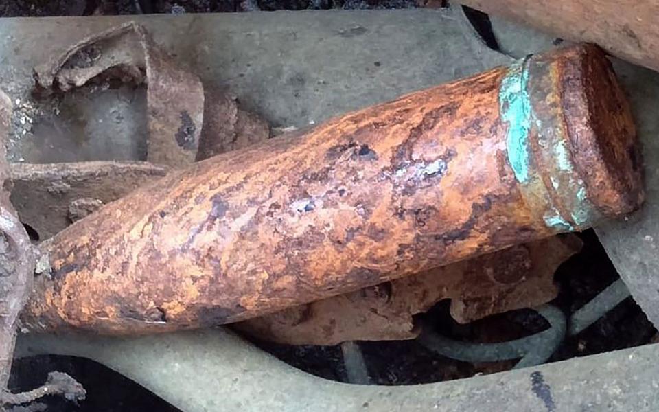 An old cannon shell taken from a Chinese vessel after anchoring near Tanjung Siang on the waters of the Malaysia's Johor state - AFP