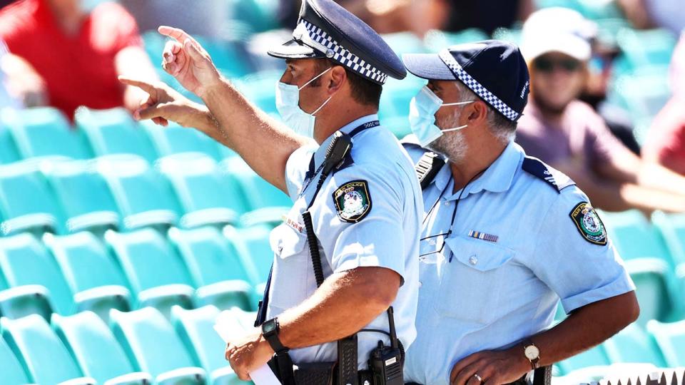 Police officers, pictured here monitoring the crowd following a complaint by Mohammed Siraj at the SCG.