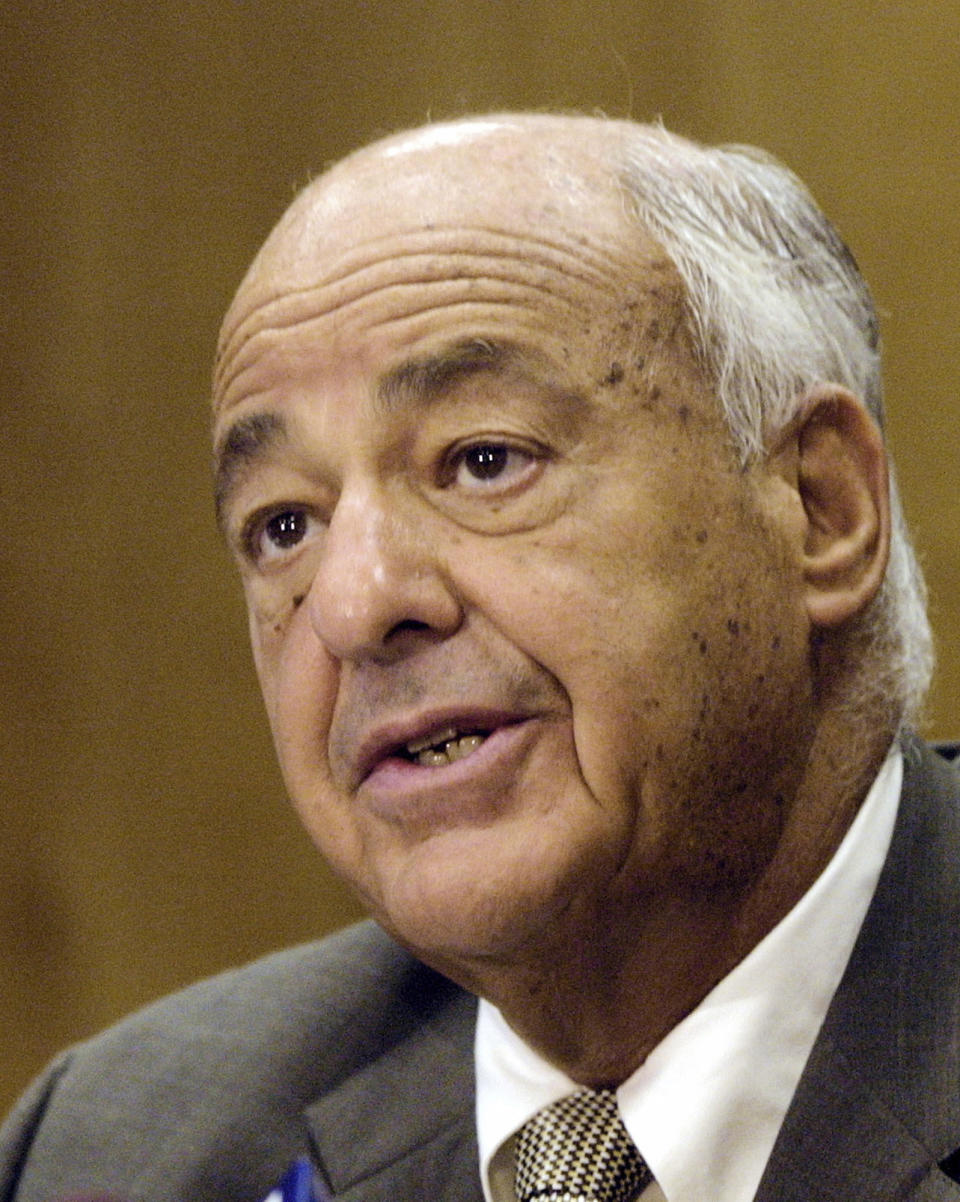 FILE - Allegheny County Coroner Dr. Cyril Wecht speaks, Aug. 23, 2002, in Pittsburgh. Wecht, a pathologist and attorney whose biting cynicism and controversial positions on high-profile deaths such as President John Kennedy’s 1963 assassination caught the attention of prosecutors and TV viewers alike, died Monday, May 13, 2024. He was 93. (AP Photo/Gary Tramontina, File)