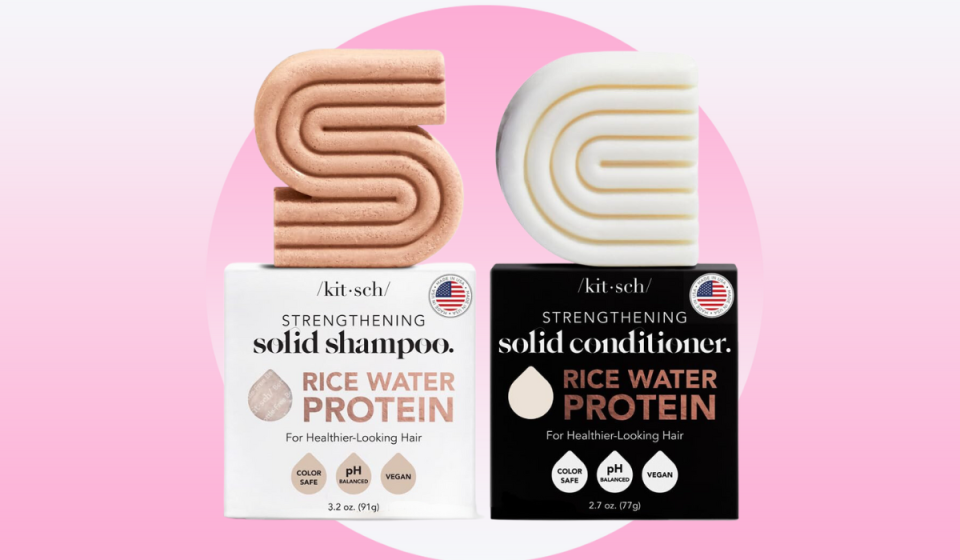 solid shampoo and conditioner bars on top of product boxes