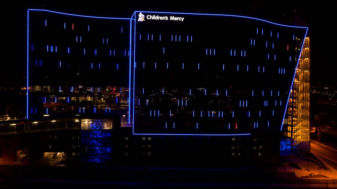 The new Children’s Mercy Research Institute building is striking at night.