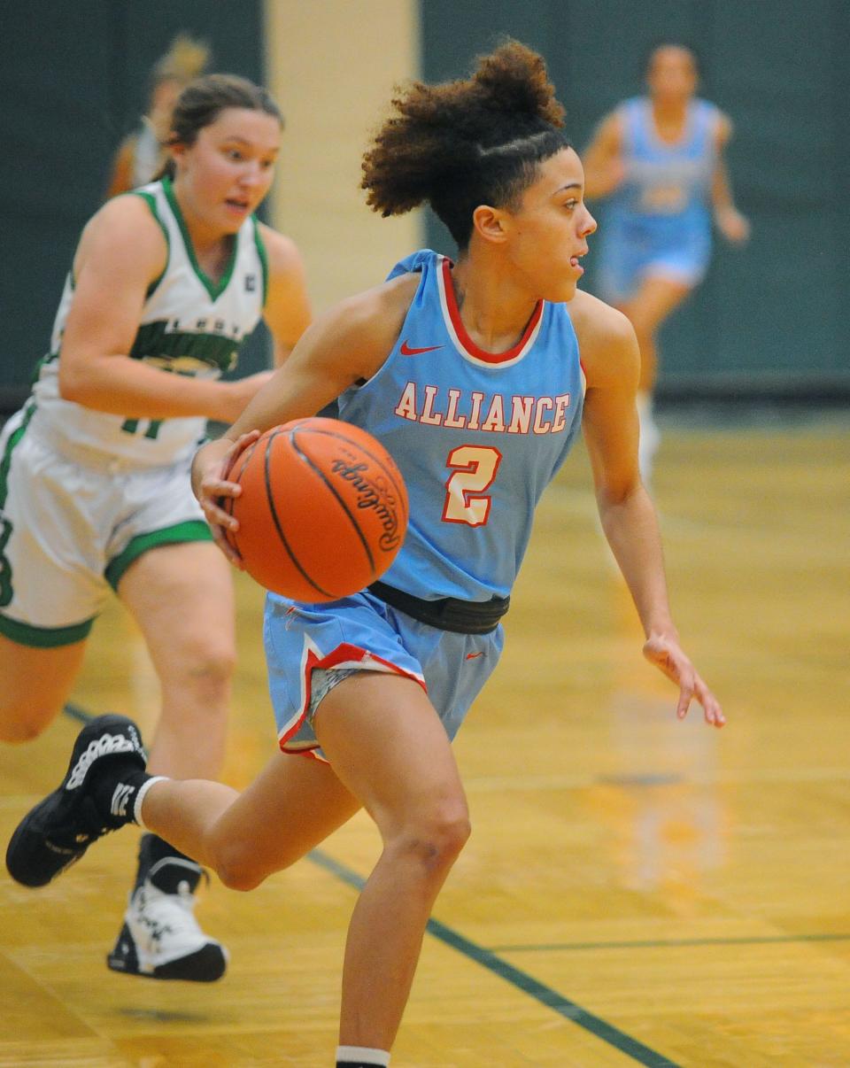 Alliance's Mar'Zae Gantz pushes the ball up the court on a fast break in an Eastern Buckeye Conference game against the Warriors Wednesday, December 7, 2022 at the West Branch Field House.