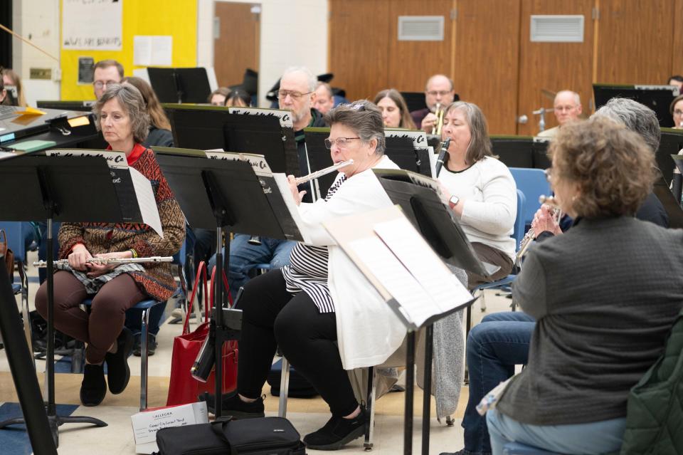 Flautist Robin Anthony rehearses with the Cereal City Concert Band at Battle Creek Central High School on Monday, March 11, 2024.