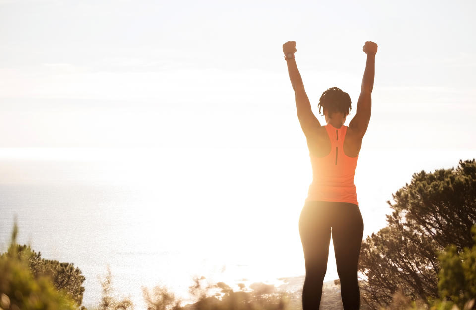 Woman who has achieved her fitness goals. (Getty Images)