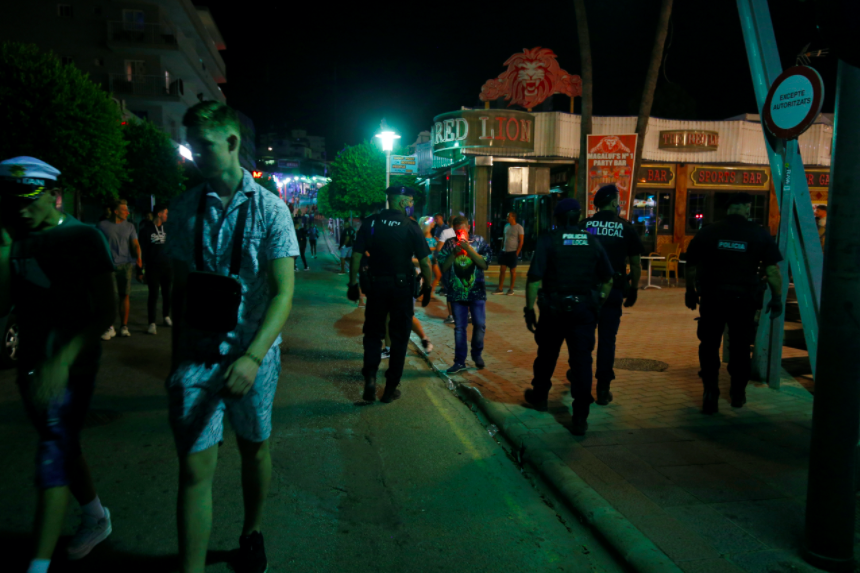 Police patrol the streets of Magaluf following the incident. (Reuters)