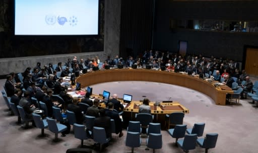 Diplomats gather for a United Nations Security Council meeting to address the impacts of climate-related disasters on international peace and security