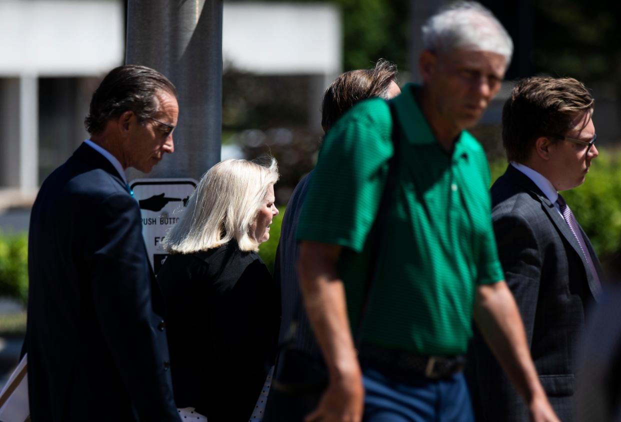 Tricia Derges leaves the Federal Courthouse with her attorneys after being found guilty of 22 counts, including wire fraud, illegal distribution of controlled substances and making false statements to investigators.