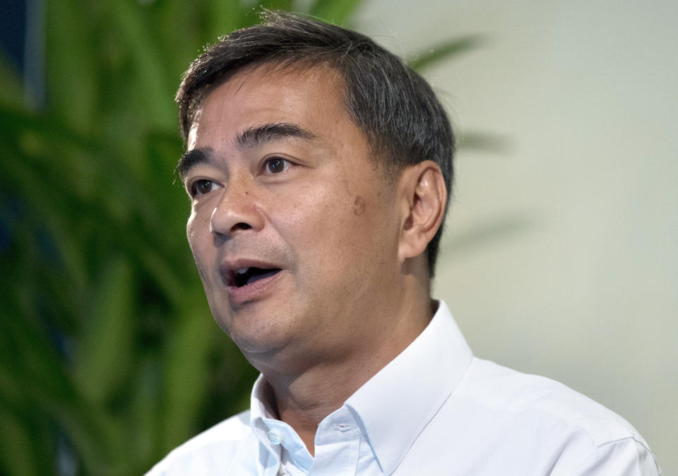 The leader of Thailand's Democrat Party Abhisit Vejjajiva talks to The Associated Press during an interview Wednesday, March 20, 2019. in Bangkok, Thailand. Abhisit says if he becomes prime minister after Sunday’s election, he’ll make careful but forceful efforts to undo undemocratic constitutional clauses imposed by the military government that took power in 2014. (AP Photo/Sakchai Lalit)