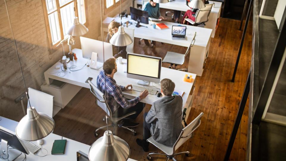 Young business people working on a startup office.