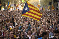 <p>People react as they celebrate the unilateral declaration of independence of Catalonia outside the Catalan Parliament, in Barcelona, Spain, Friday, Oct. 27, 2017. (Photo: Emilio Morenatti/AP) </p>