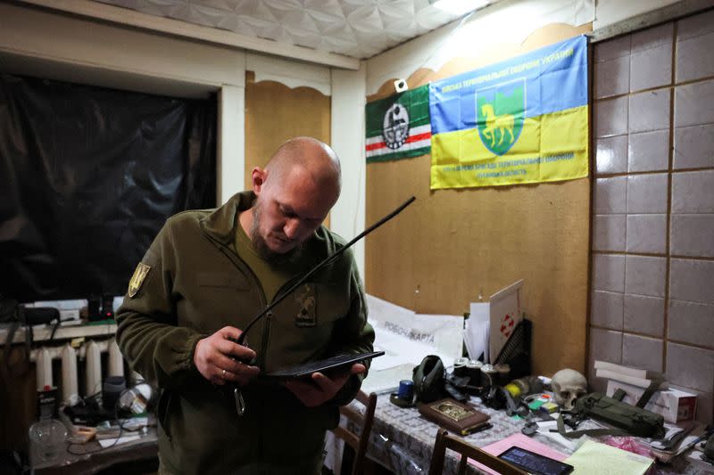 FILE PHOTO: Andrii "Tuman" (call sign "Fog"), commander of Ukrainian battalion and veteran of two wars in Russia’s Chechnya, which Tuman refers to by its historic name Ichkeria, directs his troops