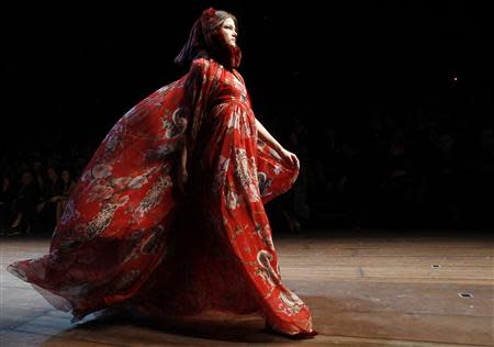 A model presents a creation from the Dolce&Gabbana Autumn/Winter 2014 collection during Milan Fashion Week February 23, 2014. REUTERS/Alessandro Garofalo